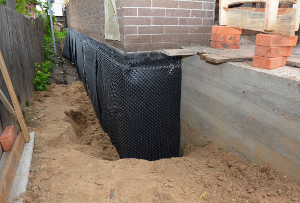 SJ Waterproofing Pros technician performing targeted Waterproofing assessment in Kendall Park, NJ
